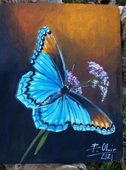 Acrylic painting of a vibrant blue butterfly with black markings resting on small purple flowers against a warm brown and dark background